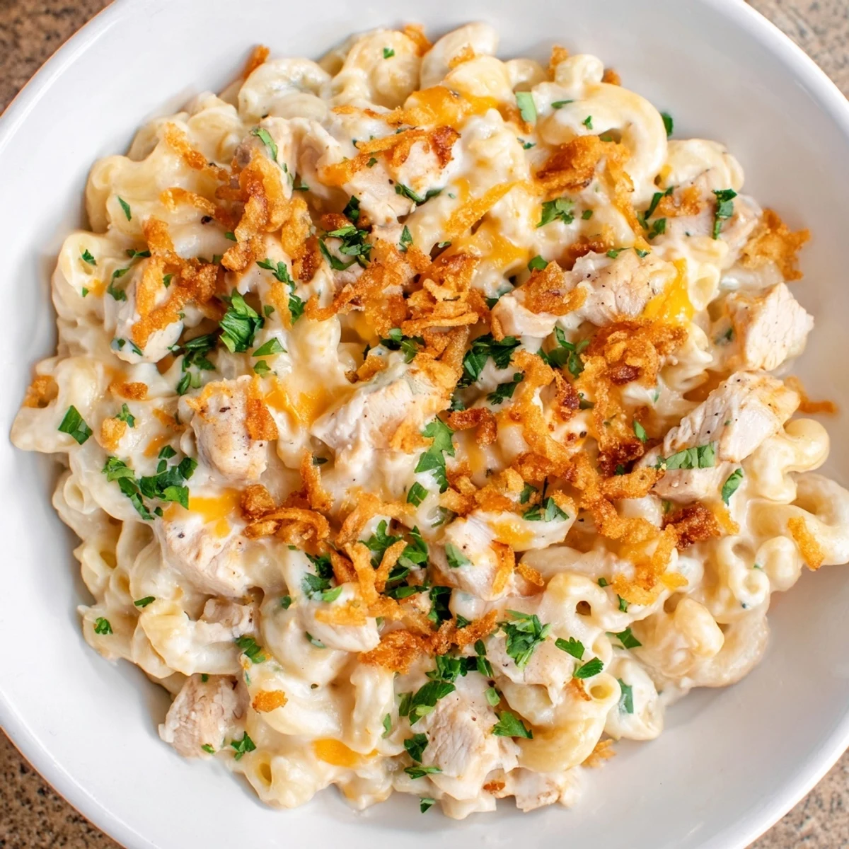 Smoky and sweet One-Pot Honey BBQ Chicken Mac and Cheese, with golden-brown chicken and melted cheese, a comforting meal.