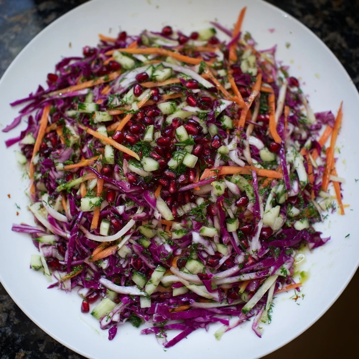 This refreshing Shirazi-Inspired Winter Slaw features a rainbow of crisp vegetables tossed in a citrus dressing, perfect.