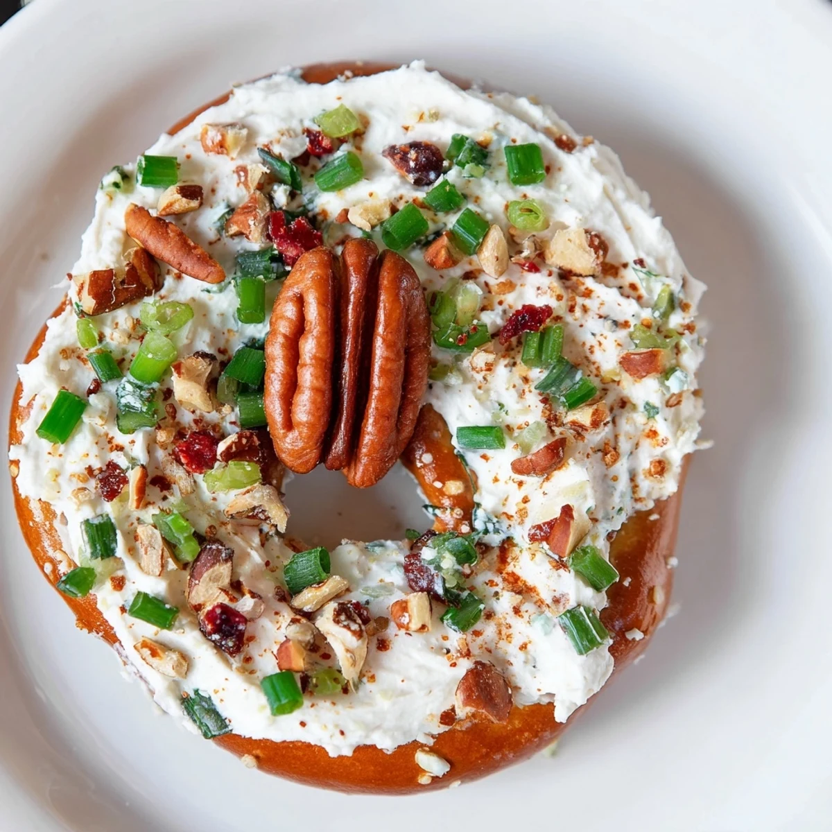 Rocket Fuel New Year's Eve Treats showcase creamy cream cheese topping crispy crackers with pecans.