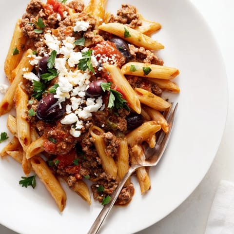 Delicious creamy Kalamata beef pasta featuring briny olives in a rich sauce.  